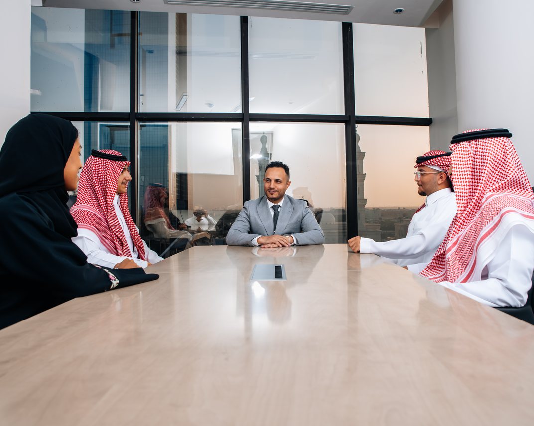 AHS partners meeting with a client at the firm’s Riyadh office